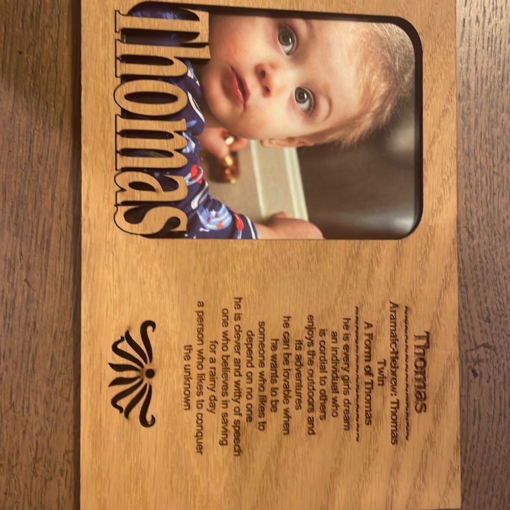 Wooden Thomas picture frame. 3” x 4.5” picture opening. Overall 7” x 5”